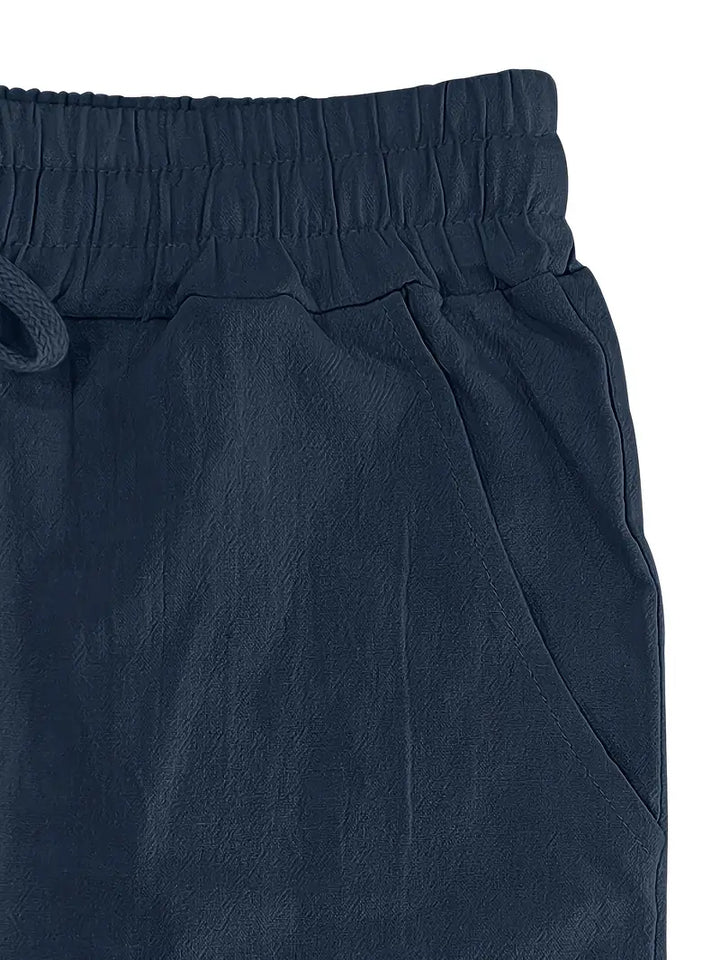Beige Herren Sommerhose, bequem & elegant. Loose fit, leicht für Urlaub & Freizeit.