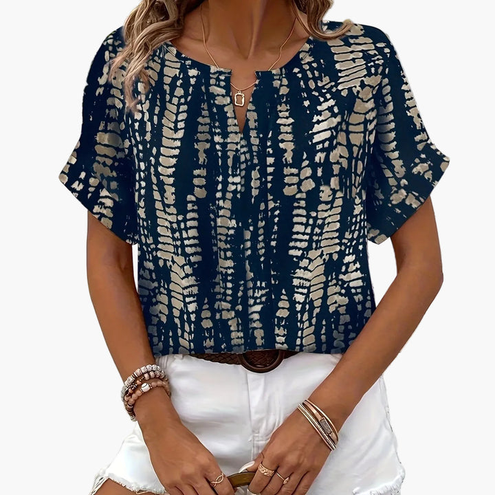 Moderne Kurzarm Bluse für Damen mit lebhaftem Muster, perfekt für Freizeitlooks.