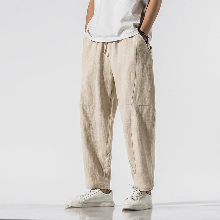 Detailaufnahme der Herren Weitbeinhose: Kordelzug an der Taille, bequemer Stoff. Perfekt für Freizeit.