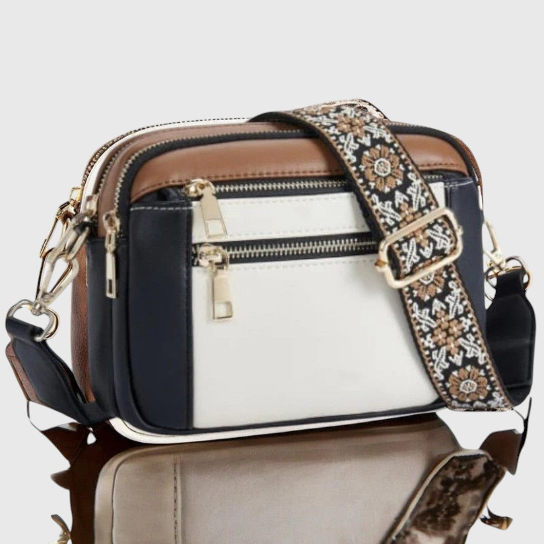 Stylische Damen Schultertasche, floral gemustert, mit Reißverschluss. Ideal für Alltag.