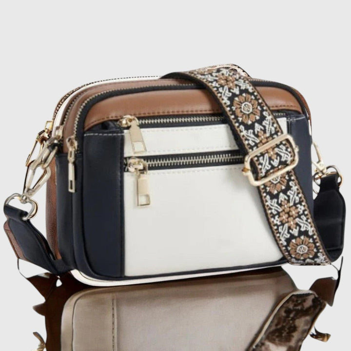 Stylische Damen Schultertasche, floral gemustert, mit Reißverschluss. Ideal für Alltag.
