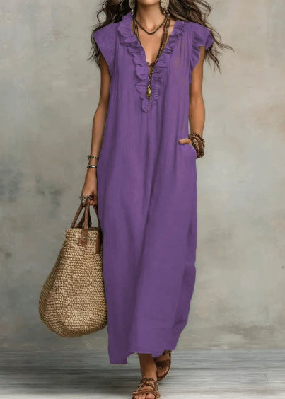 Luftiges A-Linien-Damenkleid mit verspielten Rüschen und Seitentaschen. Ideales Sommerkleid.