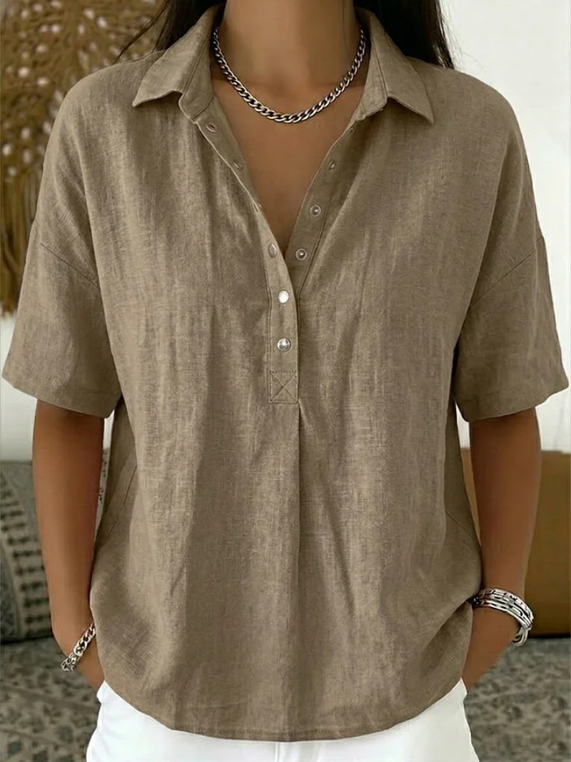 Vielseitige Damen Kurzarm-Bluse für elegante Freizeit-Looks. Lockere Passform, atmungsaktiv & kühl.