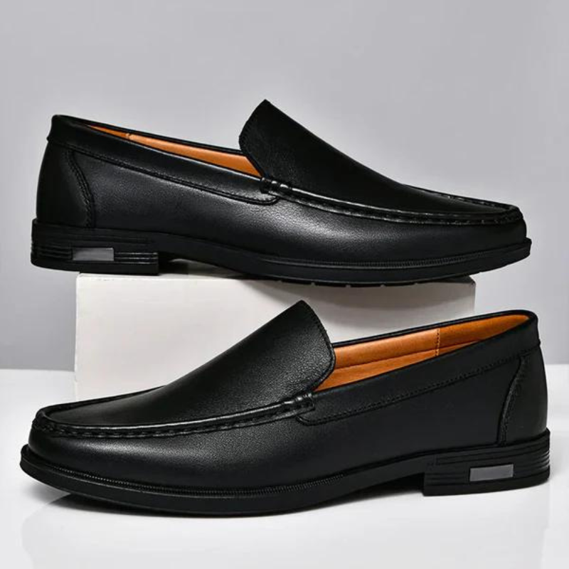 Elegante graue Herren Slipper aus Premium Leder, klassischer italienischer Stil für Komfort.