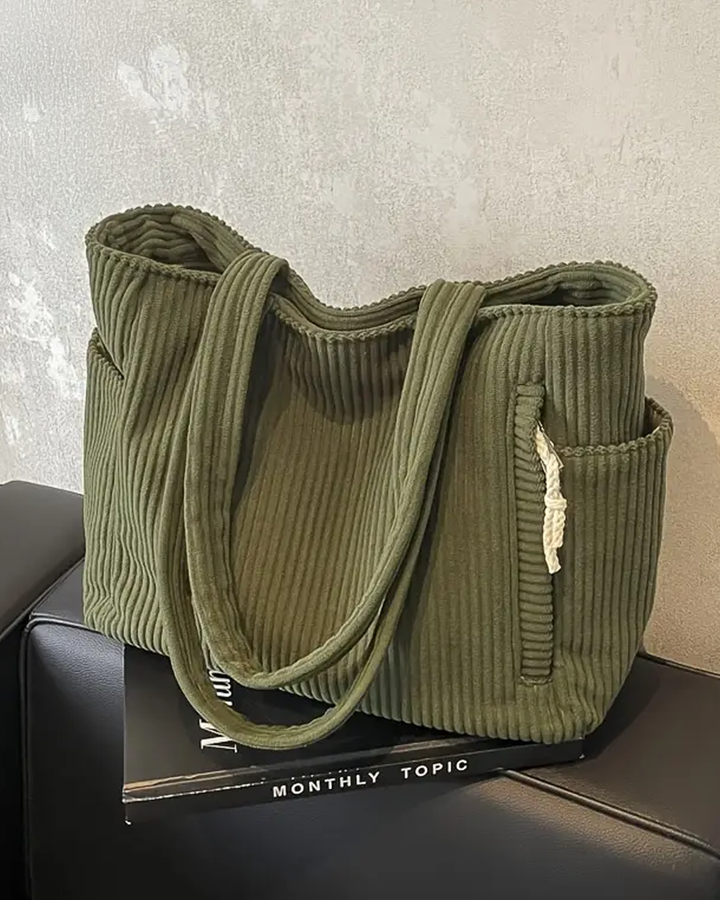 Elegante schwarze gerippte Damen Tragetasche, perfekt als Büro- oder Alltagstasche.