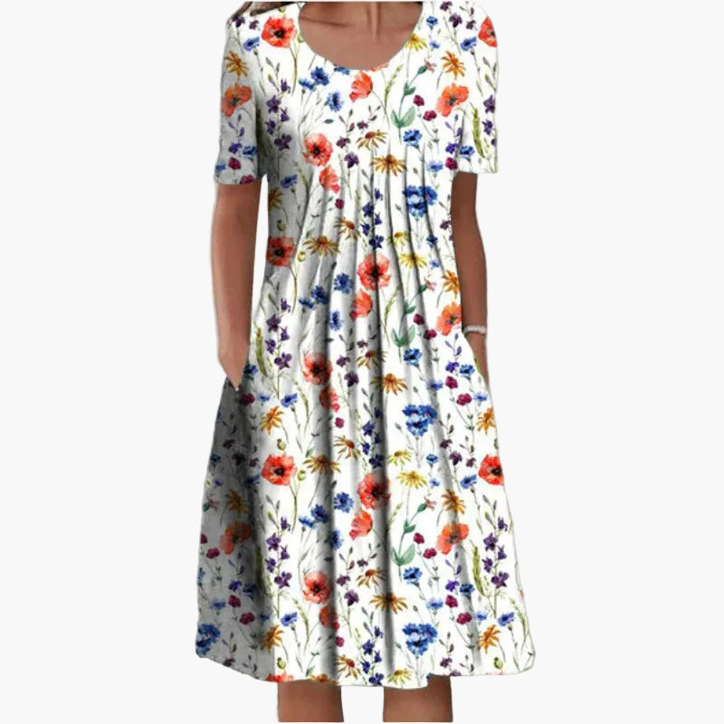 Elegantes Damen Sommerkleid in A-Linie mit lebhaftem Blumenmuster. Perfekt als Freizeit- oder Urlaubskleid.