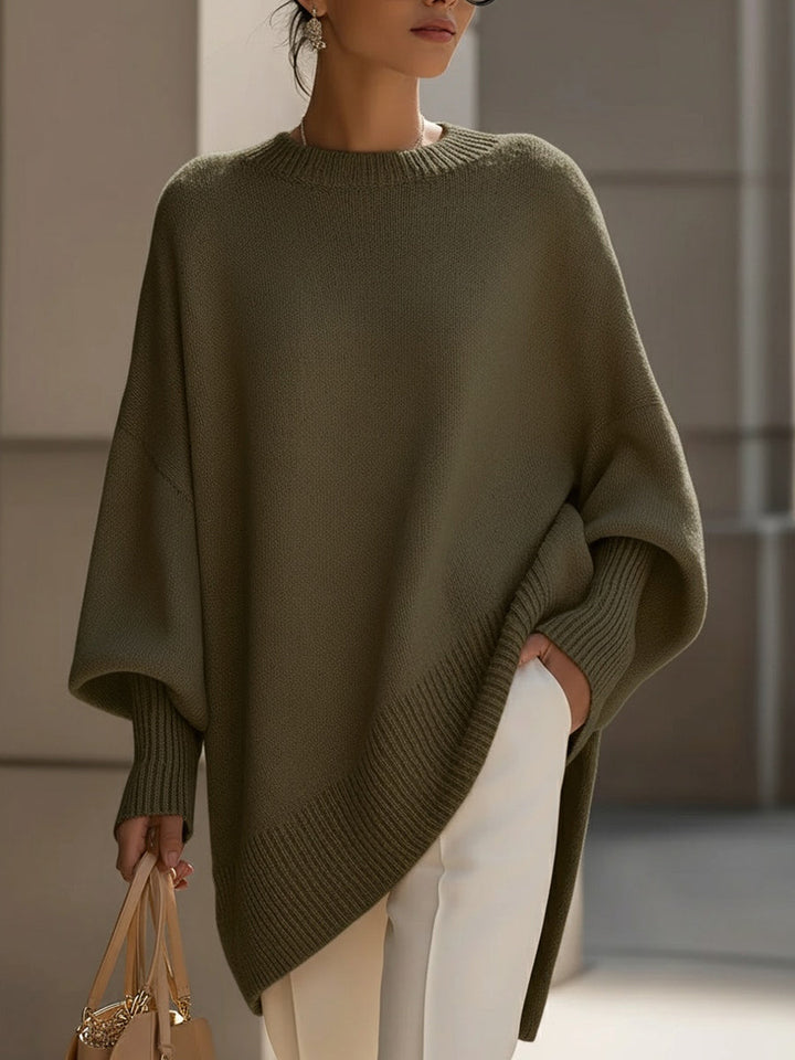 Stylischer Damen Strickpullover mit weiten Fledermausärmeln. Lässiger Oversized-Look, Rundhals.