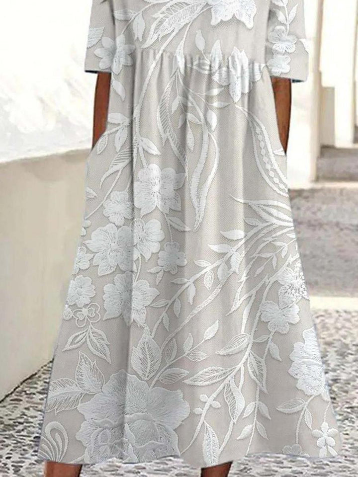 Komfortables Damen Midikleid mit attraktivem Print, kurzen Ärmeln und Seitentaschen; vielseitiges Freizeit-Sommerkleid.