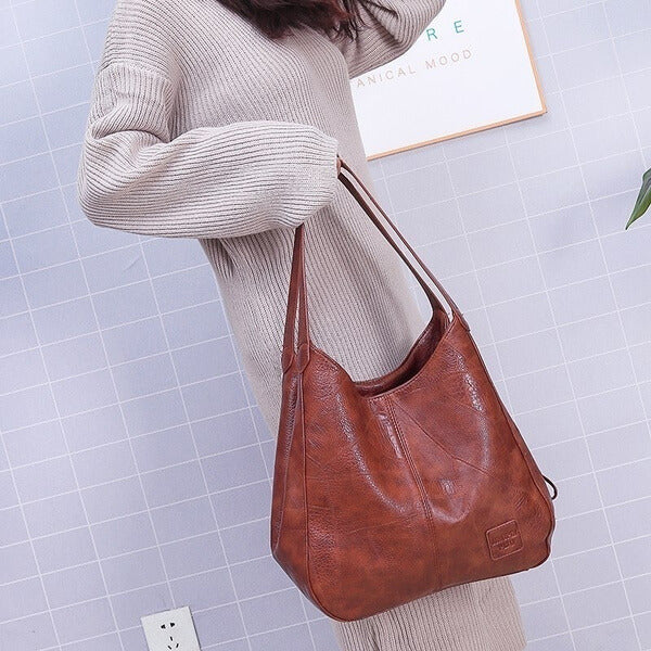 Elegante Damen PU Schultertasche, ideal als Carryall, mit sicheren Reißverschlussfächern.