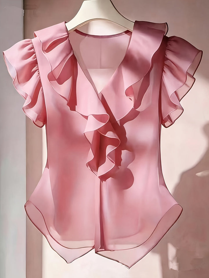 Vielseitige Rüschenbluse mit Volantärmeln. Ideal für Büro-Outfit & Freizeit-Looks.