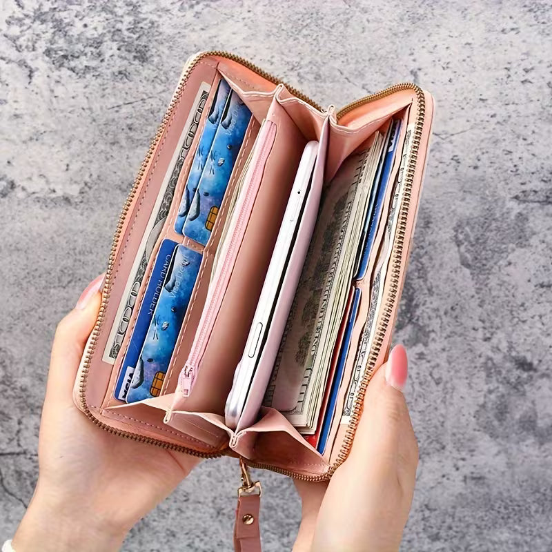 Modernes Damen Geldbörse in Rosa, Schwarz oder Blau mit abnehmbarer Handschlaufe. Stilvolles Accessoire.