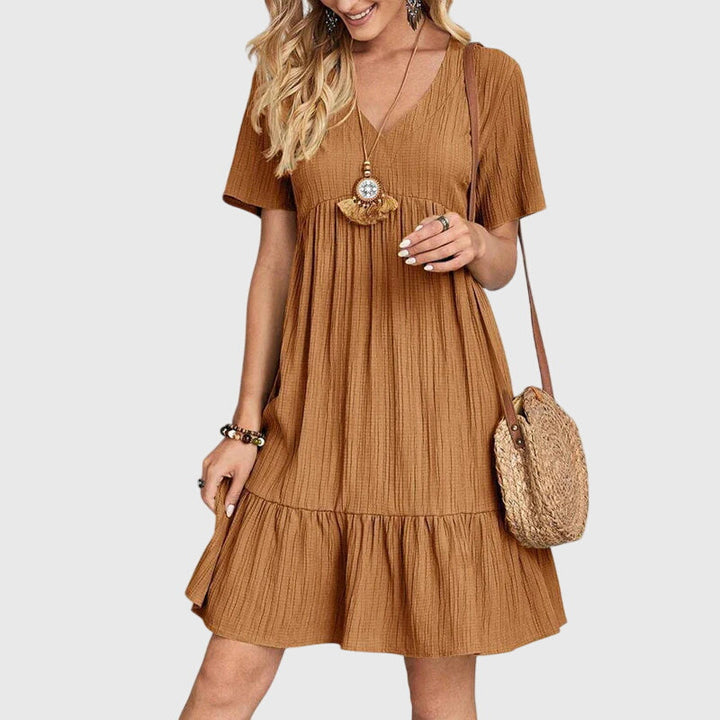 Damen Boho Midikleid, fließend & elegant. Perfektes Sommerkleid mit Kurzarm für Freizeit & Strand. Farbig & leicht.