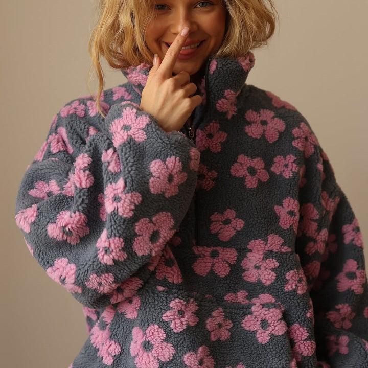 Moderner Damen Sweatshirt mit bunten Blumen, ideal für stilvolle Herbst- und Freizeit-Looks.