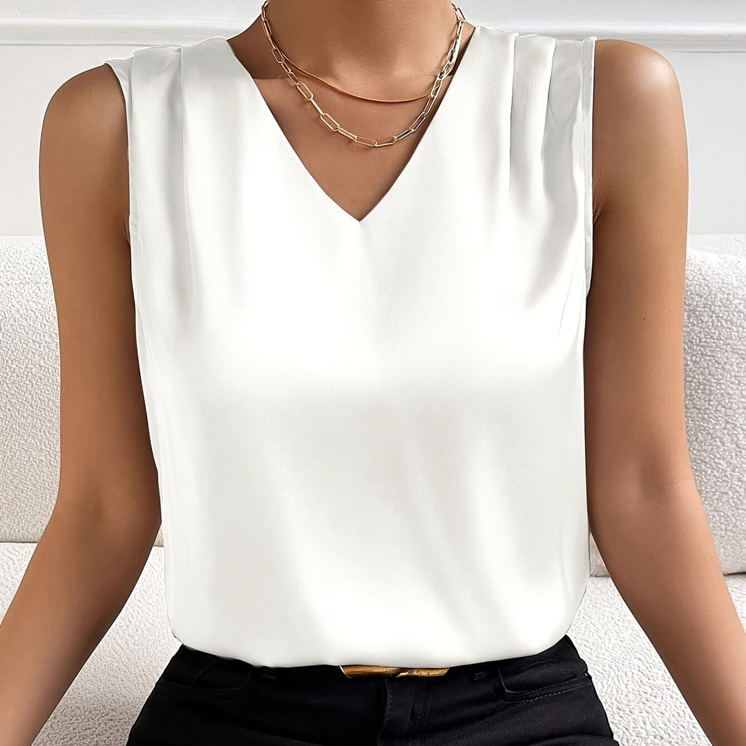 Moderne ärmellose Business Bluse für Damen mit schmeichelhaftem V-Ausschnitt.