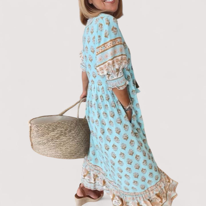 Bequemes rosafarbenes Damen V-Ausschnitt Freizeitkleid. Perfekt für Sommer und entspannte Tage.