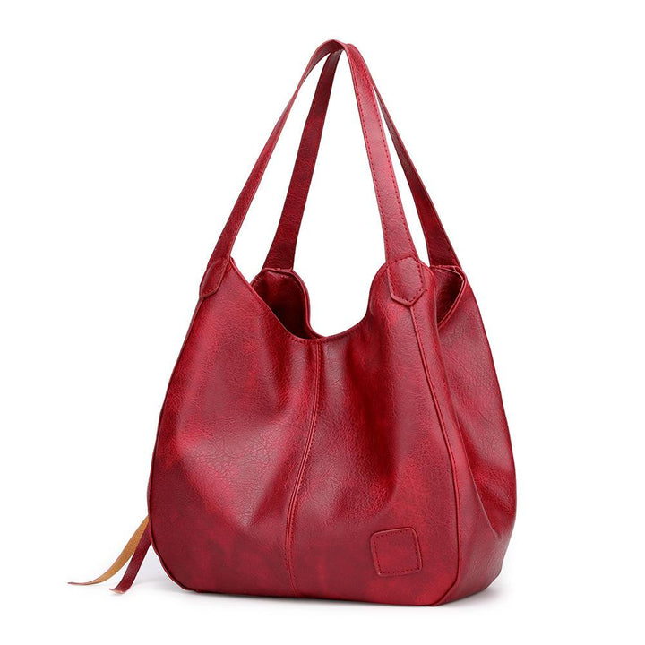 Geräumige, stilvolle Damen PU Schultertasche für Alltag & Arbeit. Ideal als Carryall.