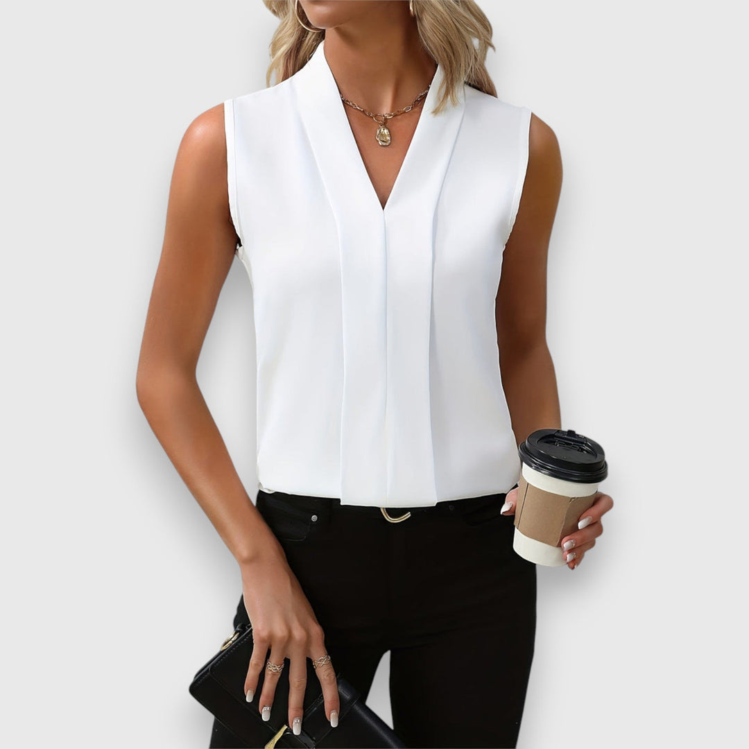 Vielseitiges weißes Damen Top, bequem für Alltag & Freizeit. Perfekt als Basic Oberteil oder zum Layering im Sommer.