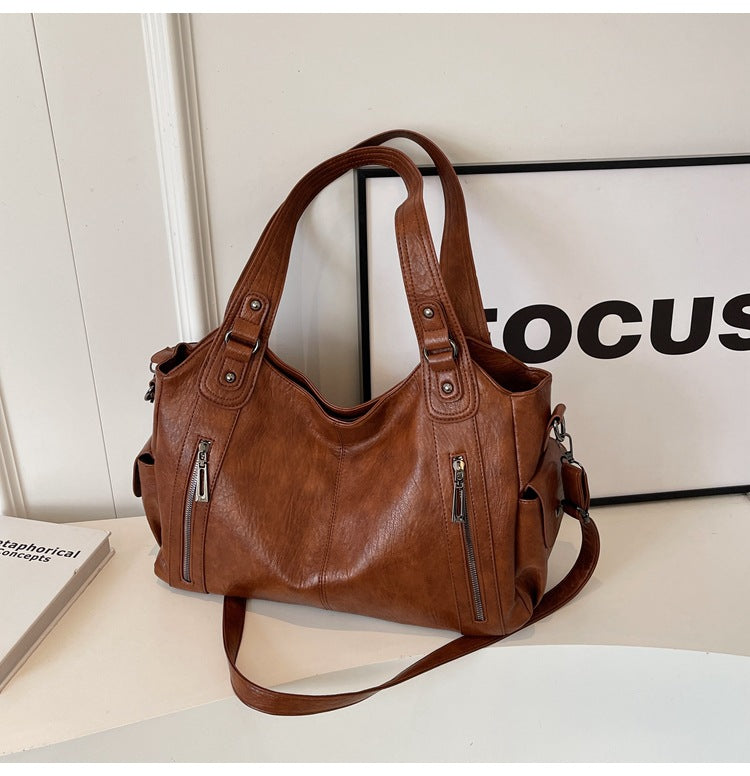 Vielseitige burgunderrote Damen Alltagstasche. Stilvolle Reisetasche & Schultertasche.