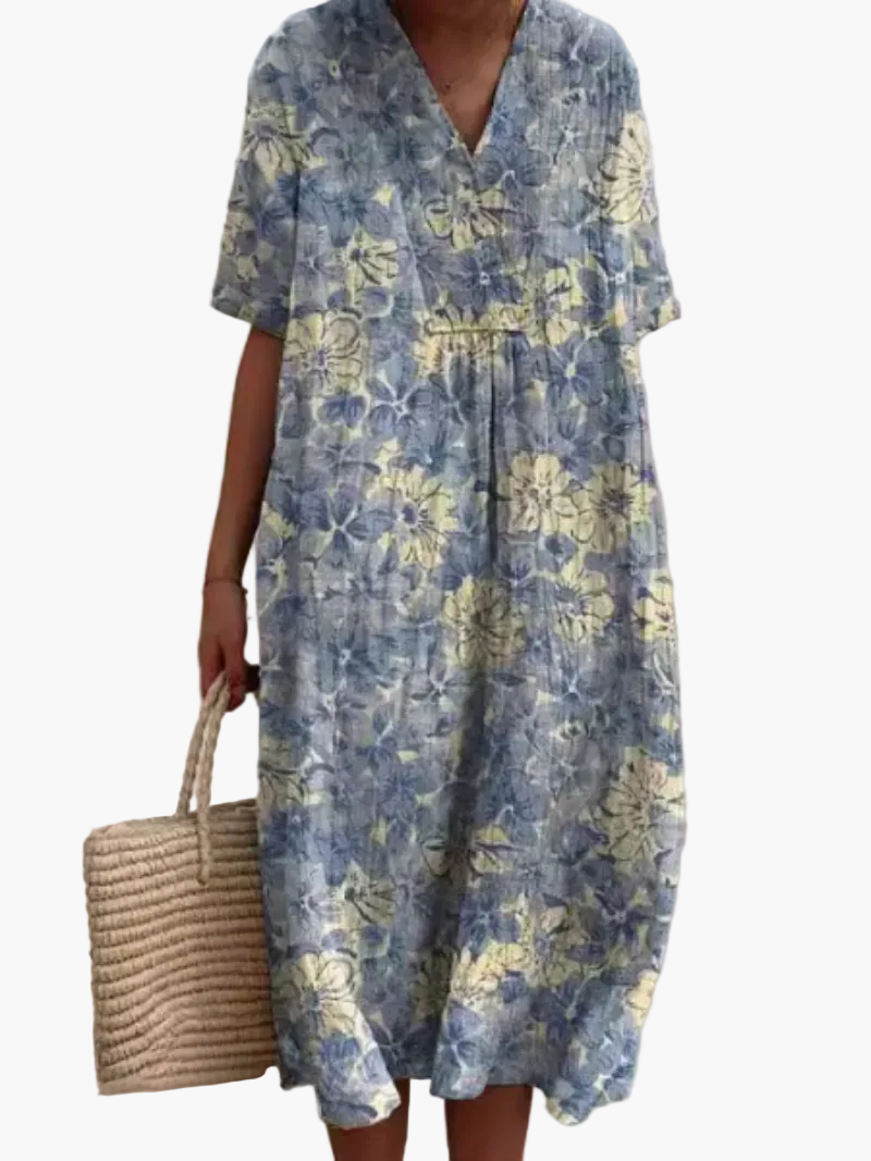 Schickes Damen Urlaubskleid, Vintage-Blumenmuster, kurze Ärmel, locker geschnitten für Komfort.