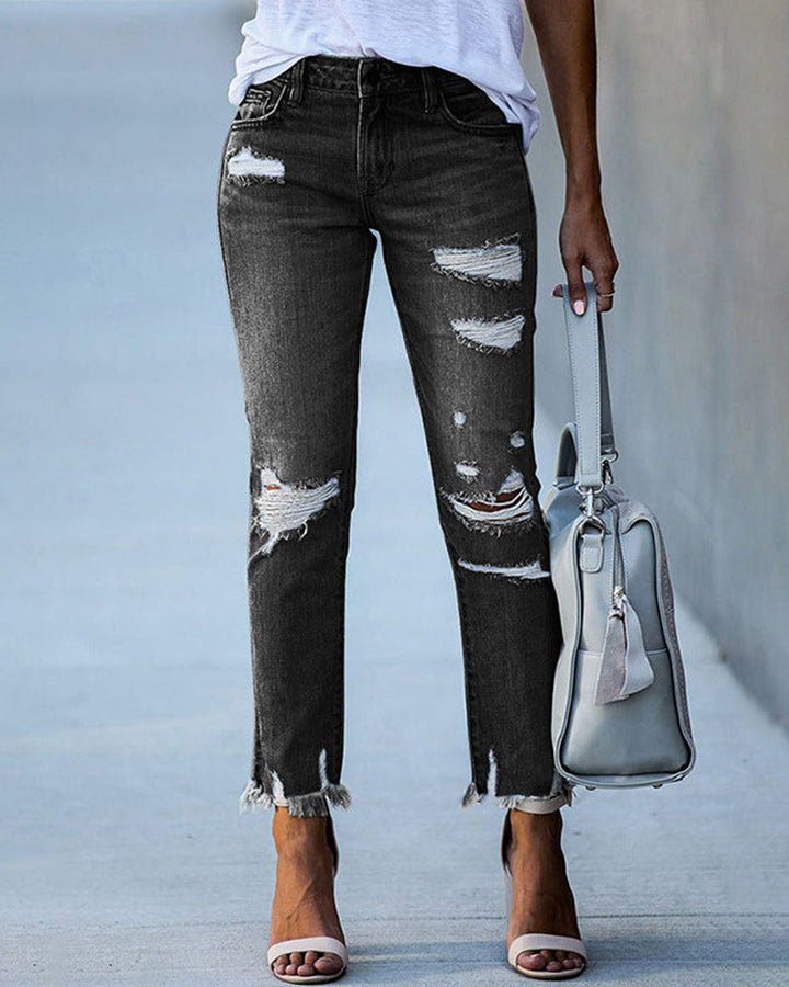 Komfortable Stretch-Damenjeans "Liora" Slim Fit in Dunkelblau mit stilvollen Rissen, ein Denim Allrounder.