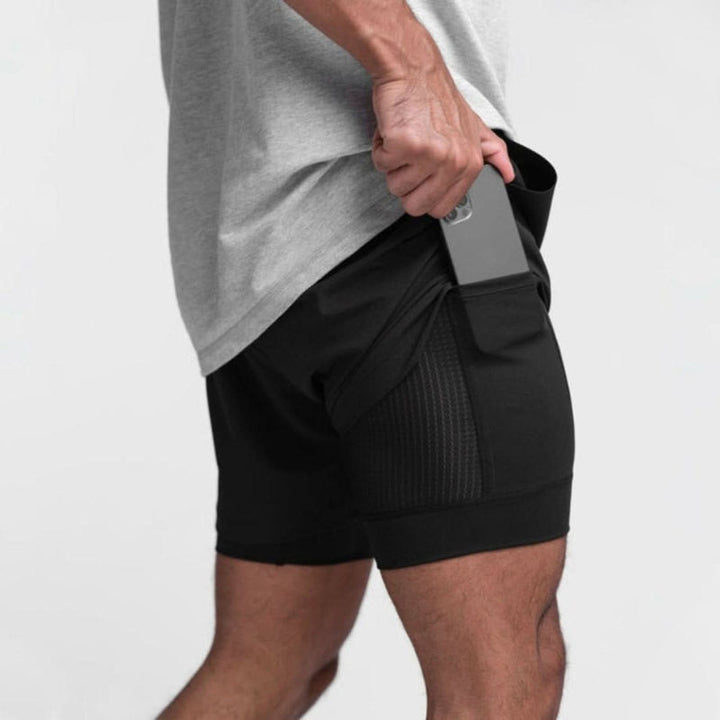 Stylische Herren 2-in-1 Sportshorts mit atmungsaktiven Innenshorts, perfekt für dein tägliches Training.
