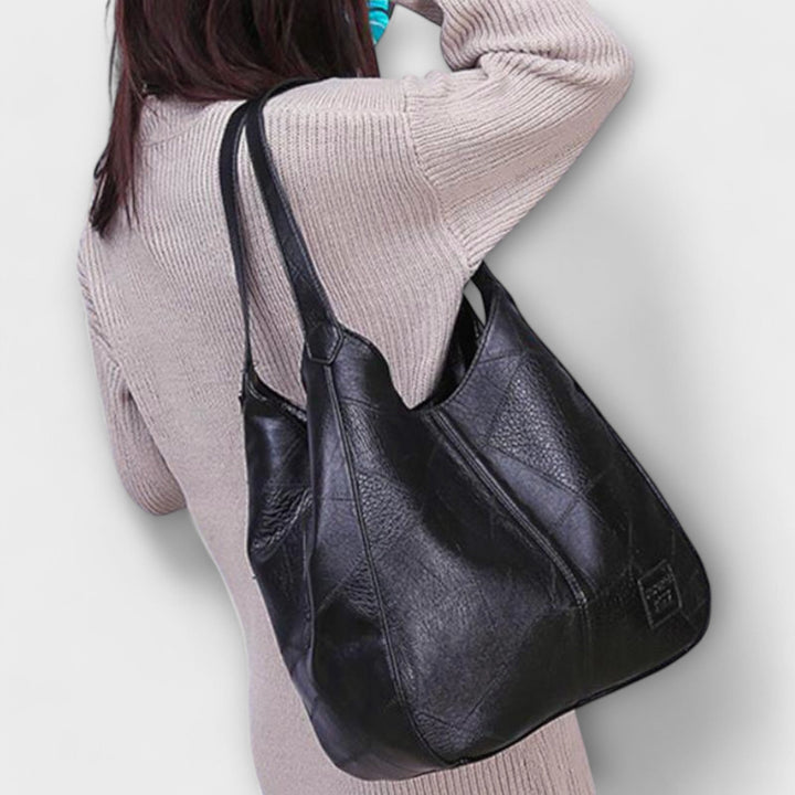 Stilvolle schwarze Vintage Ledertasche, unisex, als Schultertasche oder Handtasche für Business.