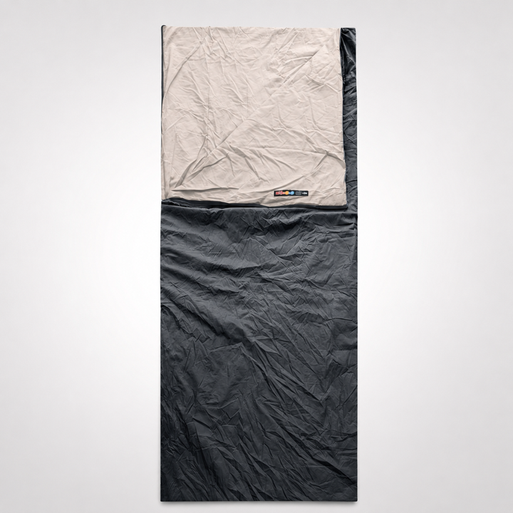 Atmungsaktiver Ultraleicht-Schlafsack, kompakt verpackbar, perfekt für Sommer-Camping & Trekking.