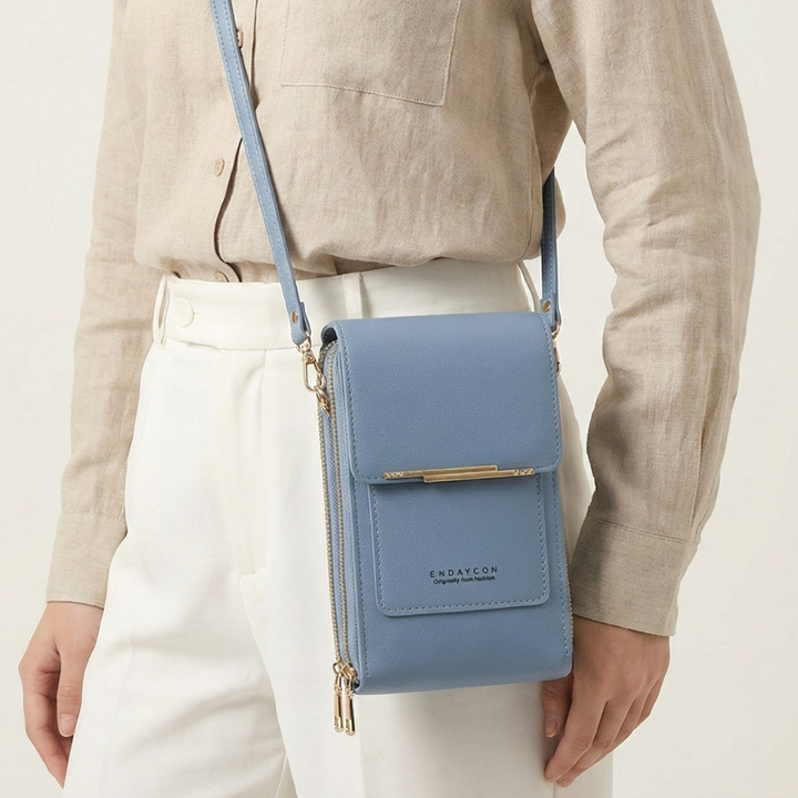 Kompakte PU-Leder Schultertasche für Damen, mit Touchscreen-Fach für schnellen Smartphone-Zugriff.