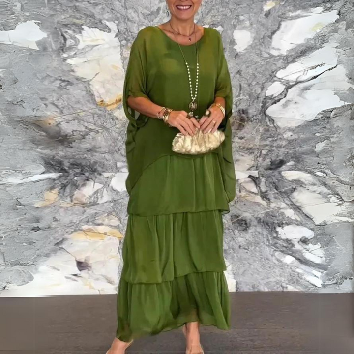 Bodenlanges Damen Maxikleid, elegant & fließend. Perfekt als festliches Abendkleid oder Sommerkleid für Events.
