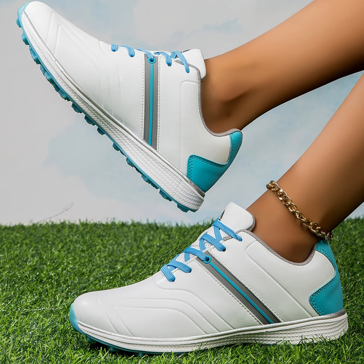 Leichte Damen Golf-Sneaker in Pink für athletische Leistung und Komfort auf dem Platz.
