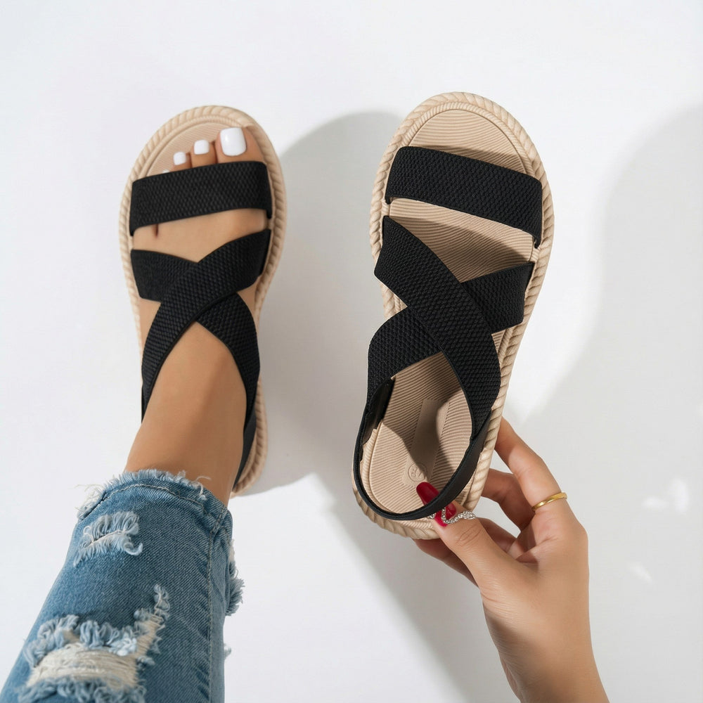Schwarze Damen-Kreuzriemen-Sandalen mit weicher Sohle. Elegante, leichte Sommerschuhe für Strand & Reise.