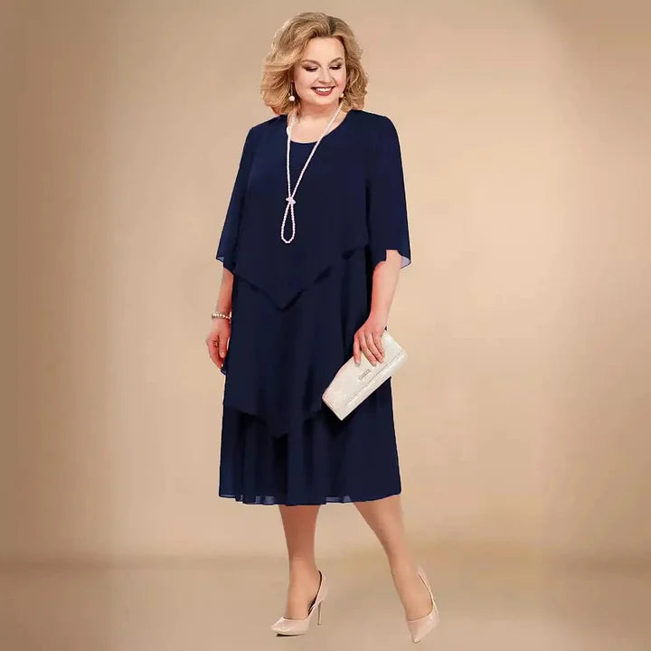 Bequemes Damen Sommer Midikleid, asymmetrisch, fließend. Modisches Freizeitkleid mit Kurzarm.