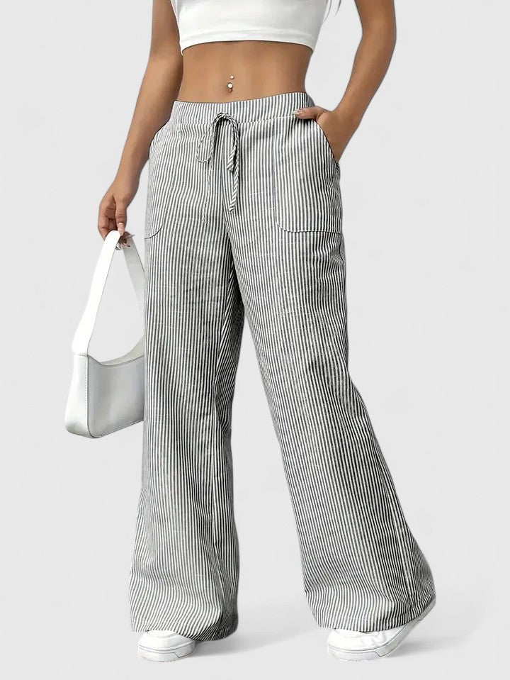 Casual Damen Wide-Leg Hose mit Bindeband. Elastischer Bund & aufgesetzte Taschen für lässigen Look.