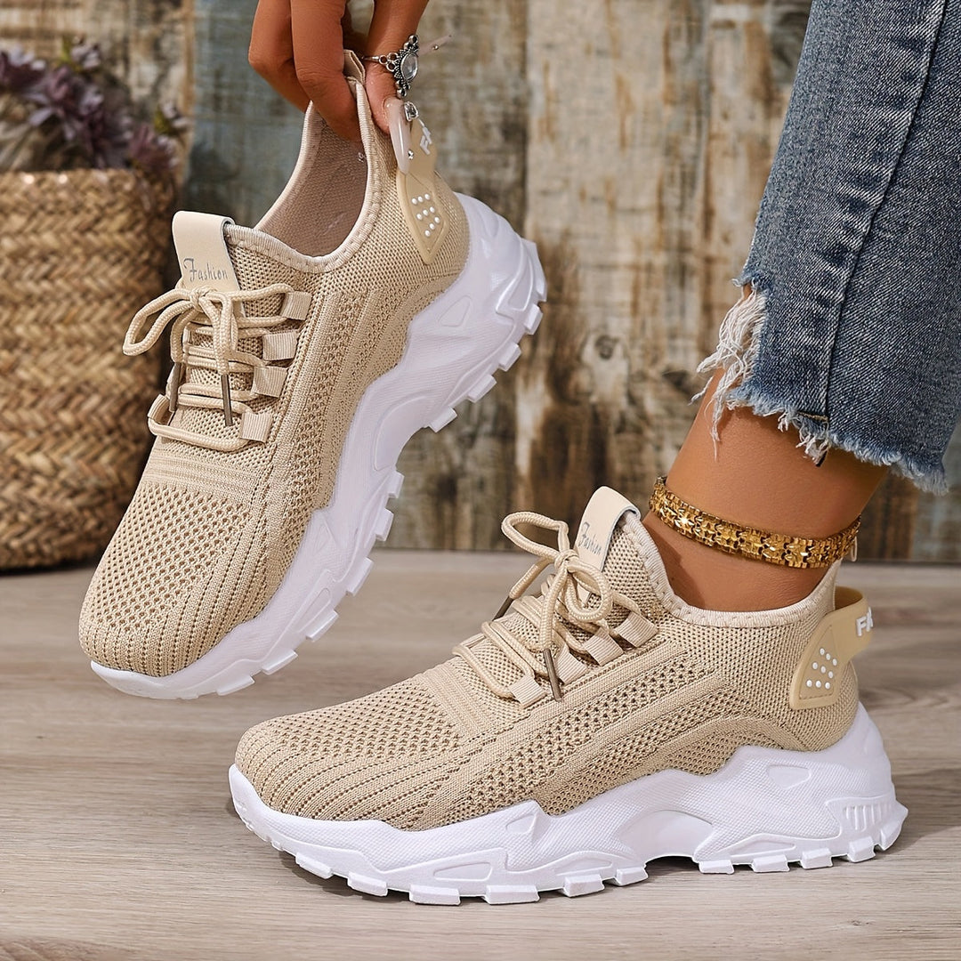 Graue Damen Sneaker, komfortable Alltagsschuhe mit modernem Design.