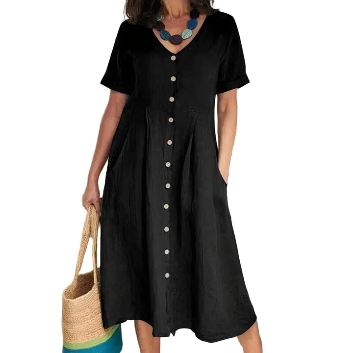 Leichtes Midi-Sommerkleid für Damen, lässig geschnitten, ideal für warme Tage.