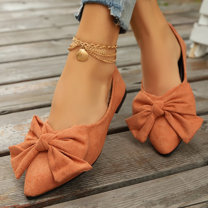 Damen Ballerinas mit spitzer Kappe und Schleife. Elegante Flats für Alltag & Büro.