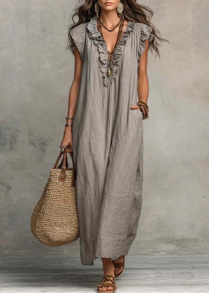Elegantes Damen A-Linien-Sommerkleid mit Rüschen und Seitentaschen. Langes, luftiges Freizeitkleid.