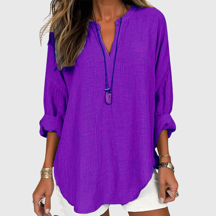 Vielseitige Damen V-Ausschnitt Bluse, locker fallend; ideal für Freizeit und elegante Sommerlooks.