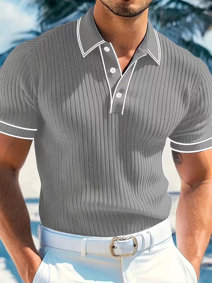 Lässiges Herren Kurzarm Polohemd mit markanten Farbblöcken. Ideal für den Sommer. Farben: Blau, Rot, Weiß.