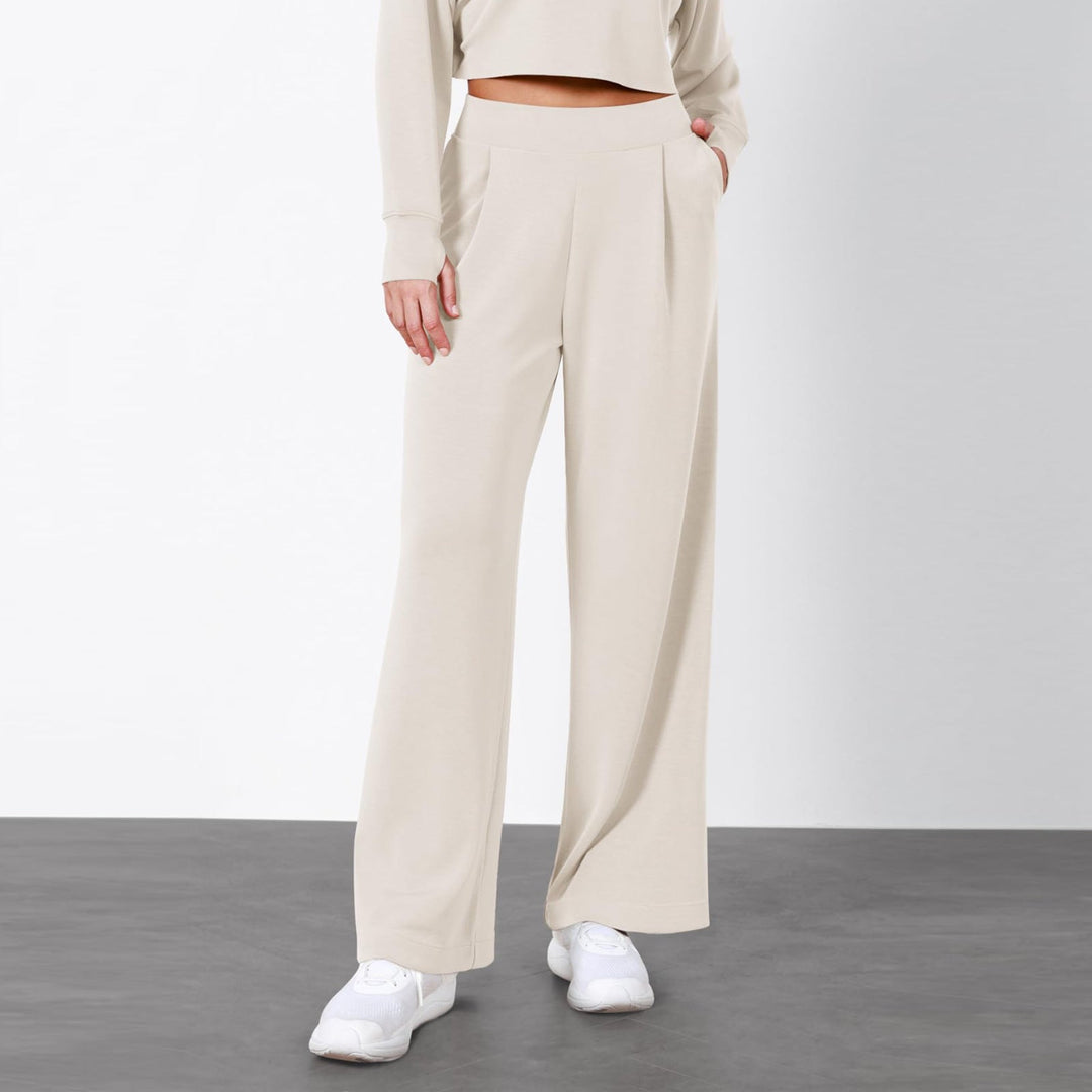 Graue elegante Damen Hose, hoher Bund, gerades Bein. Ideal als Bürohose für einen professionellen, modernen Stil.