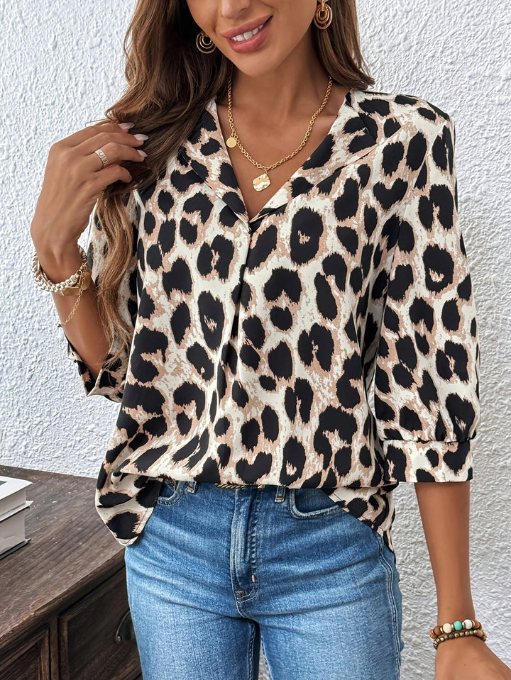 Elegante Damenbluse mit klassischem Leopardenmuster, Langarm & Reverskragen. Perfekt für Business & Freizeit.