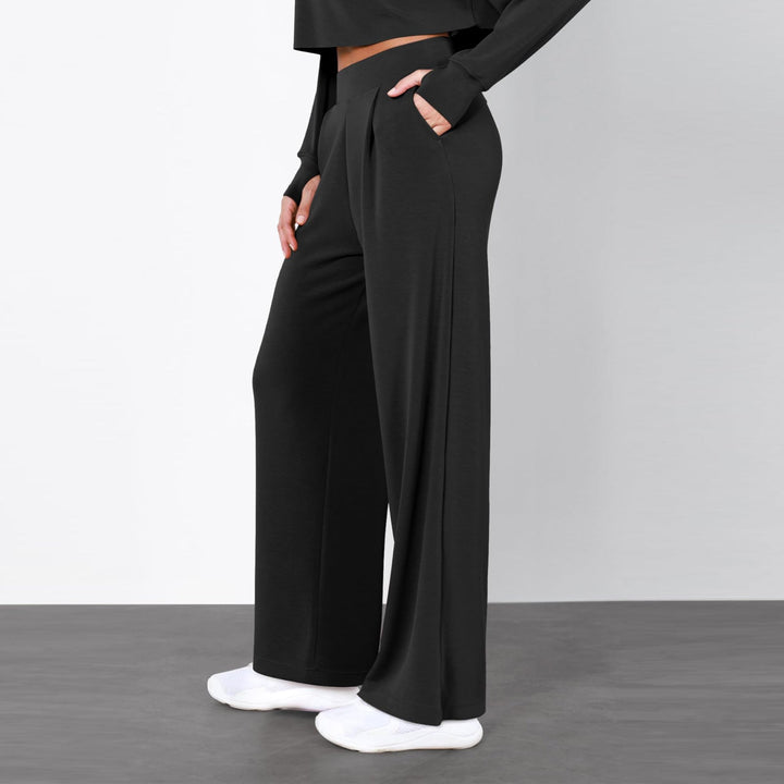 Vielseitige Damen Hose mit hohem Bund & geradem Bein. Bequem für Freizeit, elegant für den Business Look.