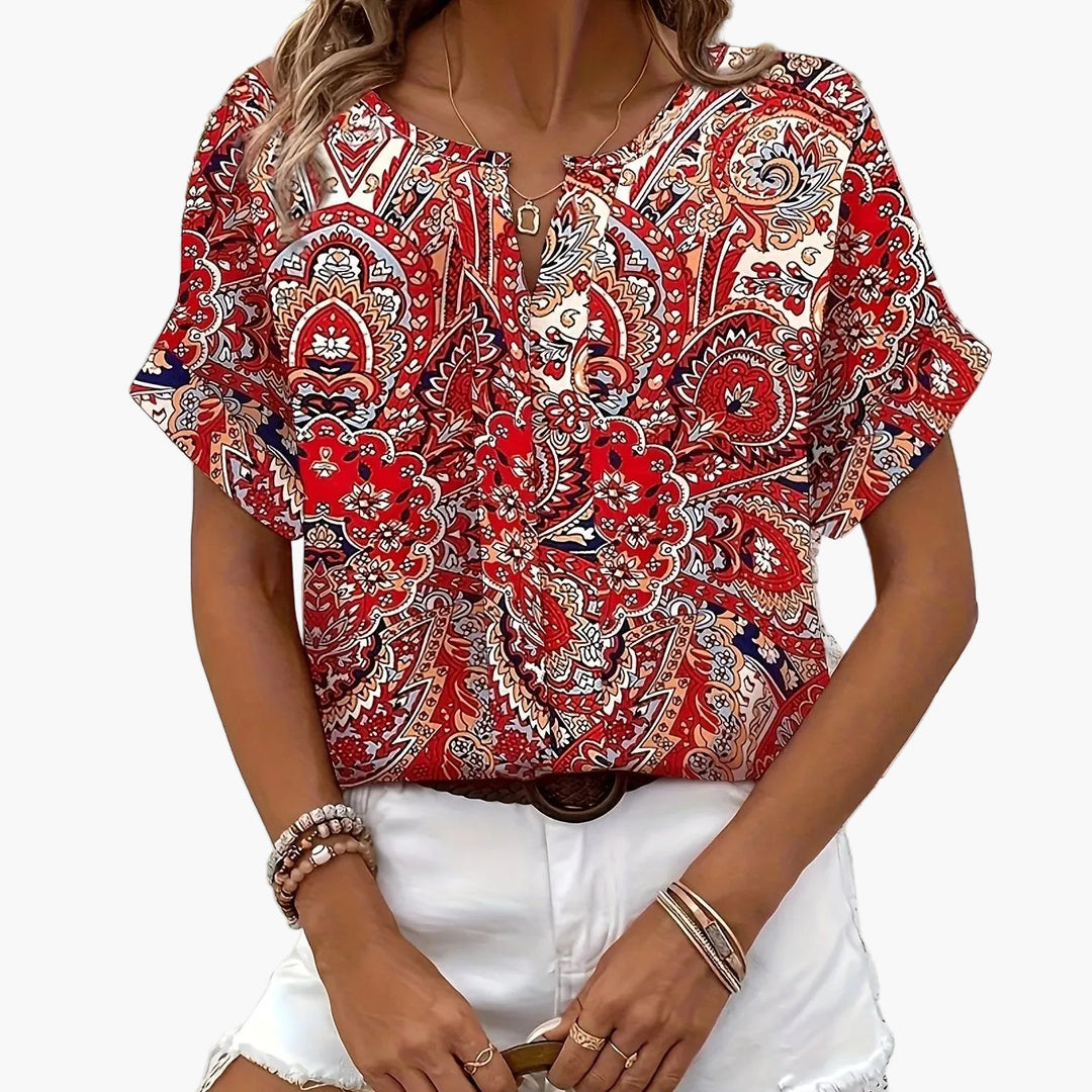 Elegantes Damen Oberteil: Kurzarm Print Bluse für einen stilvollen Auftritt.