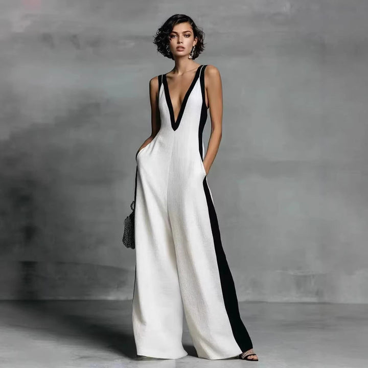 Eleganter Damen-Jumpsuit mit V-Ausschnitt und weitem Bein für stilvolle Sommer-Freizeitmode.