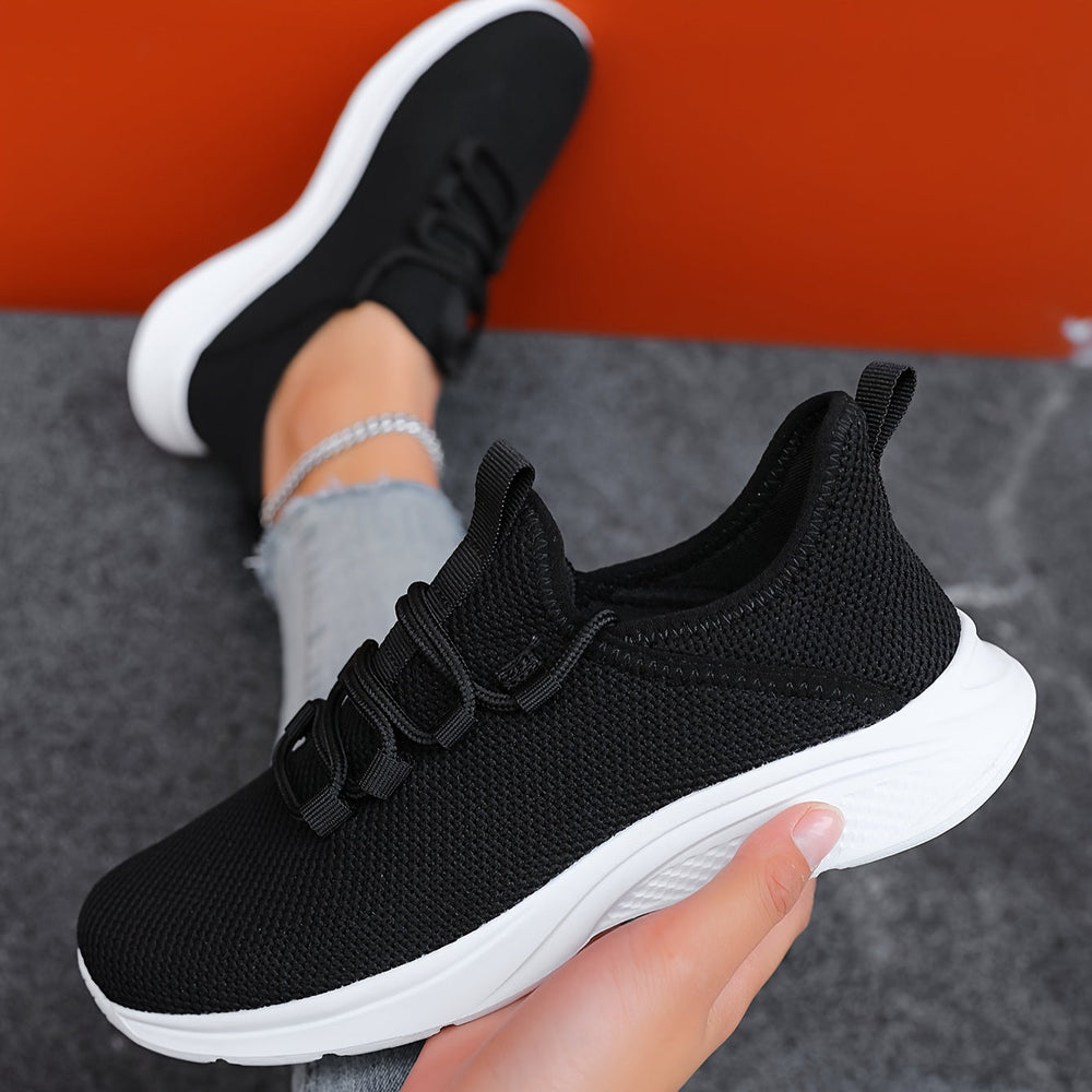 Bequeme Damen Freizeitschuhe, ultraleichte Sneaker mit atmungsaktivem Mesh-Obermaterial im Seitenprofil.