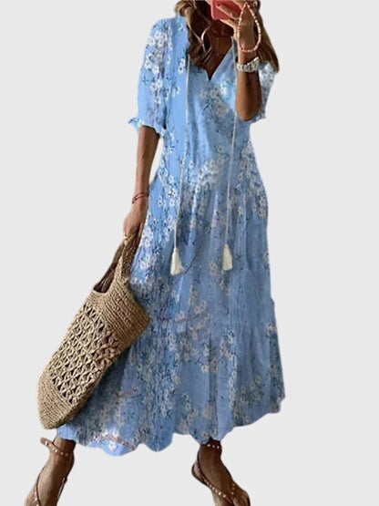 Leichtes, lockeres Damen Boho Sommerkleid im Vintage-Stil. Bequemes Freizeitkleid mit V-Ausschnitt.