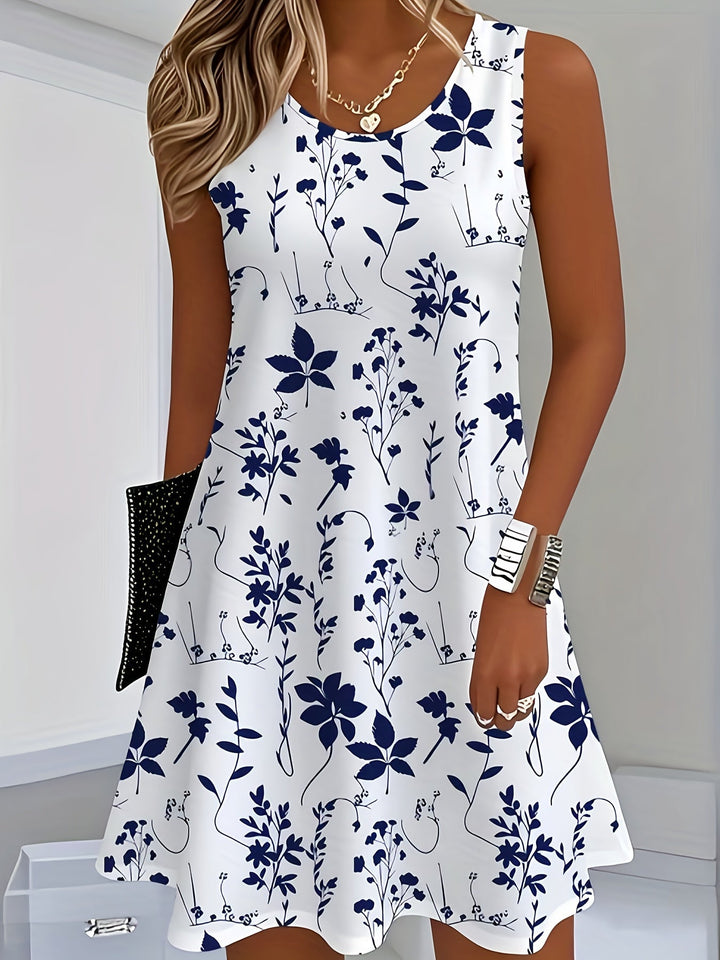 Elegantes ärmelloses Damen Sommerkleid mit farbenfrohem Blumenmuster. Ideal für Frühling & Sommer.