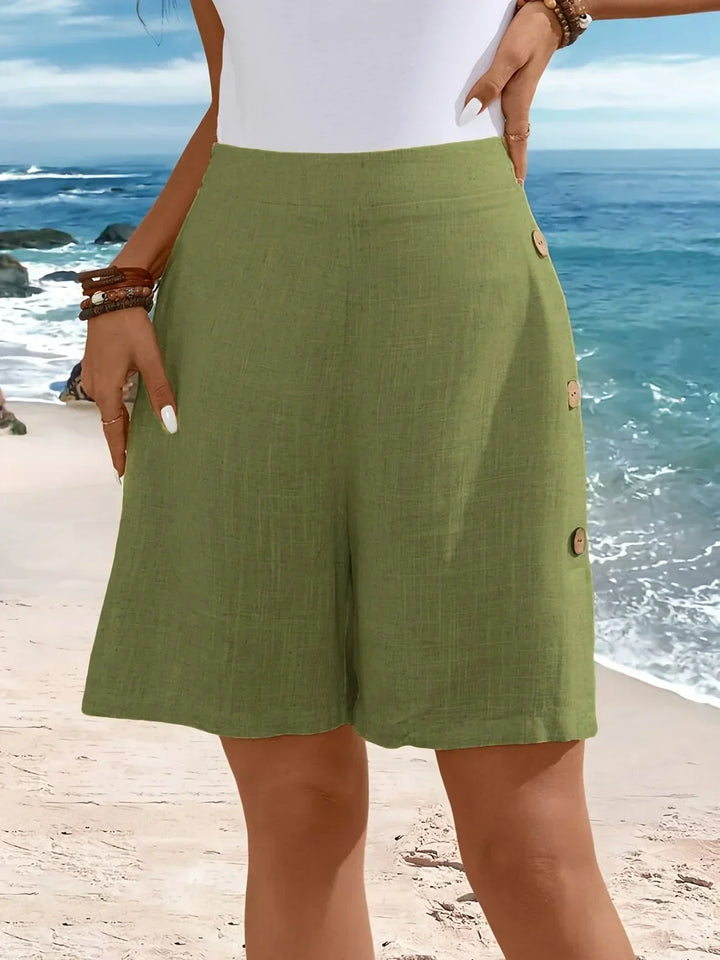 Vielseitige grüne Damenshorts mit Knöpfen, perfekt für Casual-Outfits oder entspannte Sommertage.