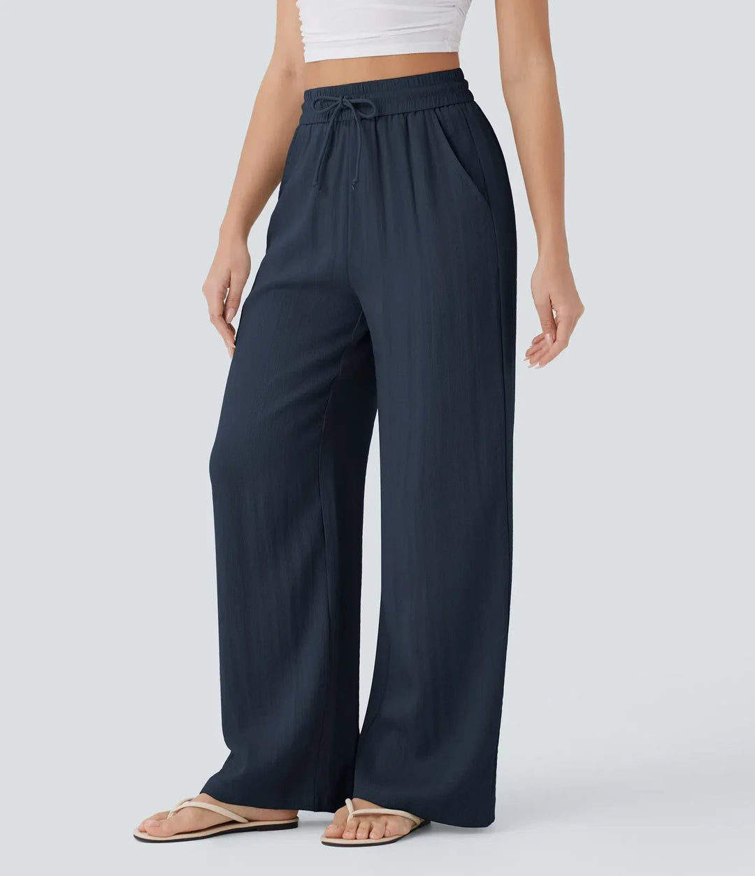Elegante Damen Freizeithose: weites Bein, Sommerhose. Lockerpassform, Seitentaschen & Kordelzug.