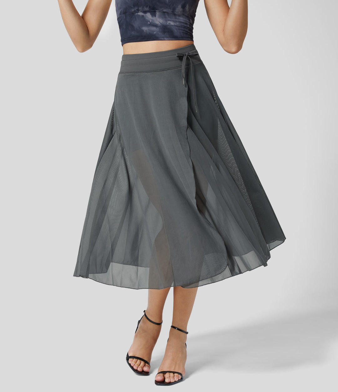 Schwarzer Midi-Rock, Damen, elegantes Lagen-Design, flexibler Bund, versteckte Tasche.